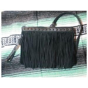 Spikes and fringe purse.